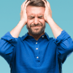 man with headache - Eastside Chiropractic can help headache pain.